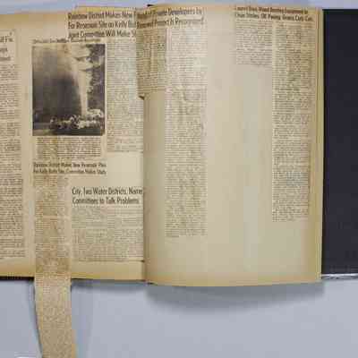 Pages 64-65 newspaper clipping unfolded