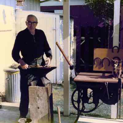 Photograph of Tony Meier at his anvil, Springfield, 1976
