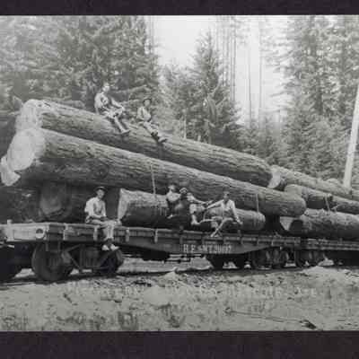 Photograph of crew on loaded log train on Wade Creek spur west of Marcola, Oregon