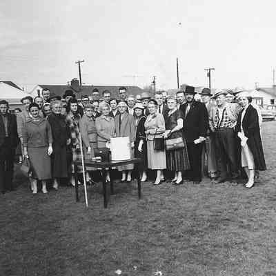 Photograph of members of Oregon Centennial celebration committee with time capsule, 1959