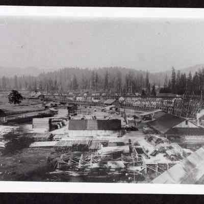 Photograph of lumber yard and log flume, Marcola, Oregon, 1907