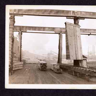 Photograph on postcard of cutoff or trim saw at Jones Lumber Company, Portland, Oregon, date unknown
