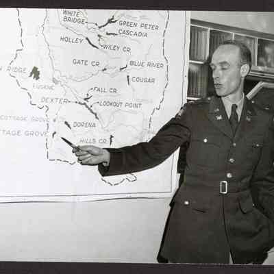Photograph, U.S Army Corps Colonel with Oregon Map, Undated