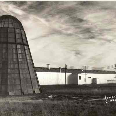 Photograph of a building and a Wigwam, undated