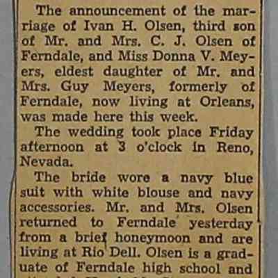 Loose newspaper clippings at back of scrapbook
