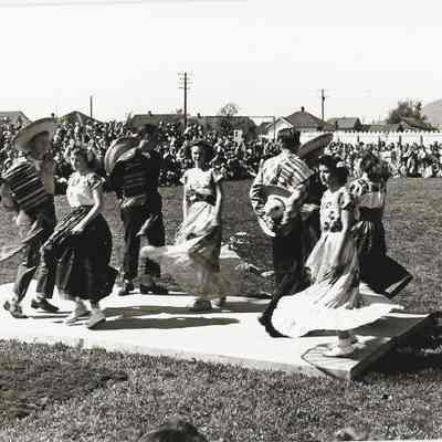 Photograph of Springfield High School student dancing at a festival, Springfield Oregon, unknown date