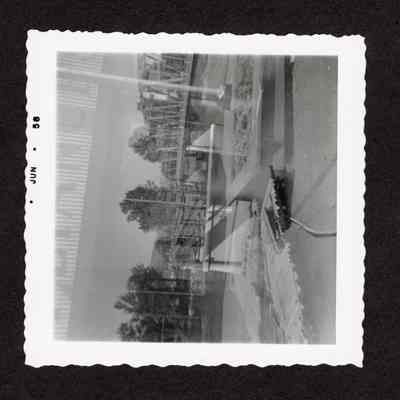 Photograph of newest Springfield, Oregon bridge June 1958, taken through a window.