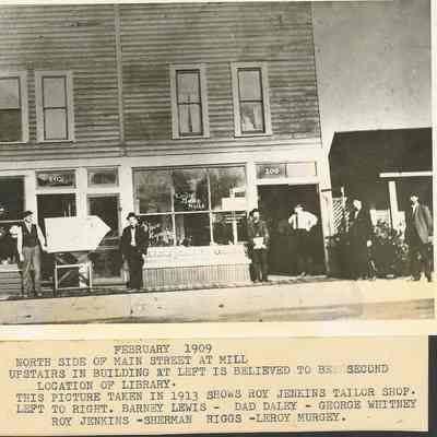 Photograph of men standing in front of various buildings, Springfield, Oregon, circa 1909 - 1913