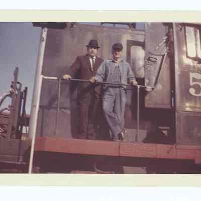 Photograph of Harry and Tommy Fox, on the South Pacific train '5220', undated
