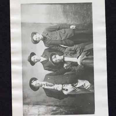 Photograph of 4 unknown men in suits, undated