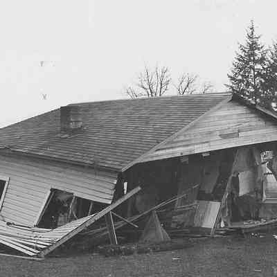 Photograph of collapsed house post flood, date unknown