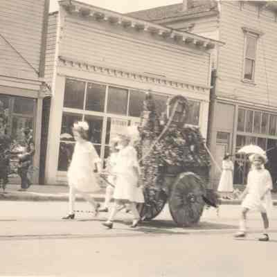 Young girls walking in a parade, Christian Endeavor, Main Street, Springfield, Oregon, 1920