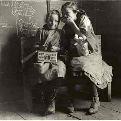 Photograph of Carol Houde and Friend eating Lunch at School, Undated