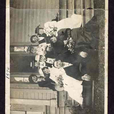 Photograph of a large group on porch, Springfield, Oregon, 1896