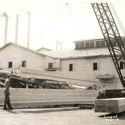 Photograph of Mill Workers Loading Timber, Undated