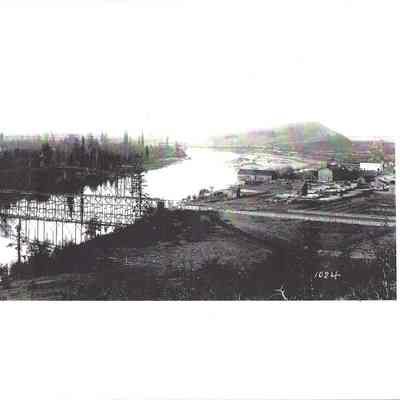 Photograph of northwest view of the Springfield Flouring Mill and Steel Bridge, Springfield, Oregon, 1882