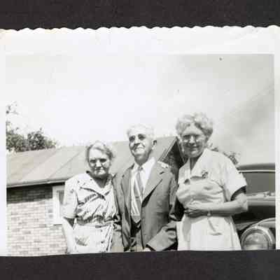 Photograph of Charles H Myers and two women, circa 1940