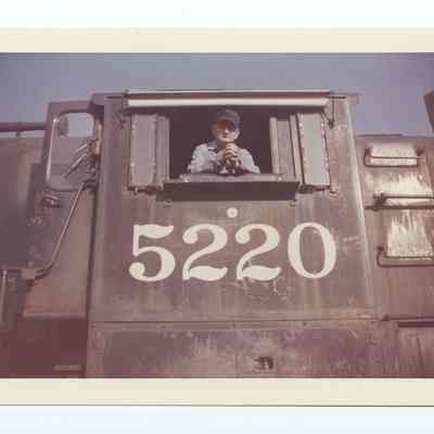 Photograph of Harry Fox on the South Pacific train '5220', undated