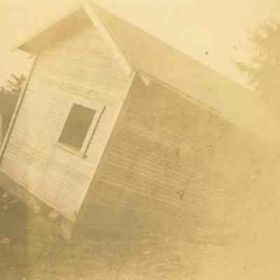Photograph of Merril's Garage Tipped Over by Flood Water, Glenwood, OR, 1927