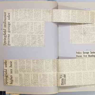 Pages  12 - 13 newspaper clippings unfolded