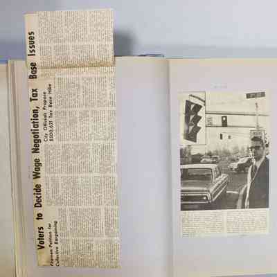Pages 14 - 15 newspaper clipping unfolded