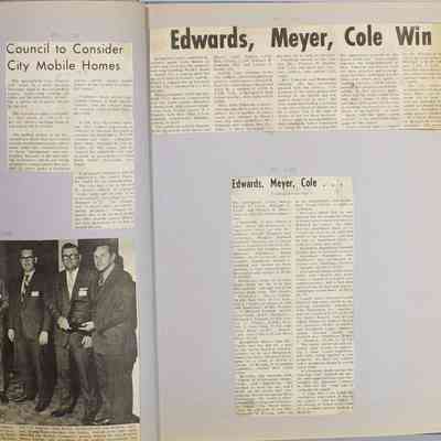 Pages 16 - 17 newspaper clipping unfolded