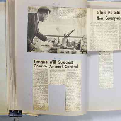 Pages 26 - 27 newspaper clipping unfolded