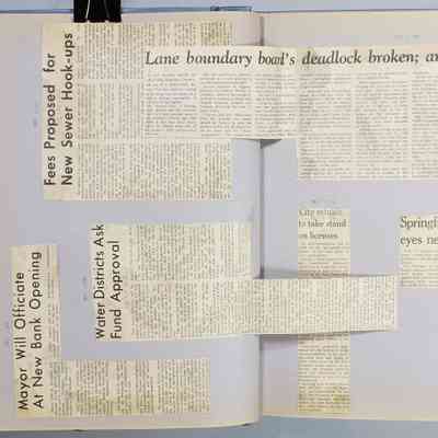 Pages 32 - 33 newspaper clipping unfolded