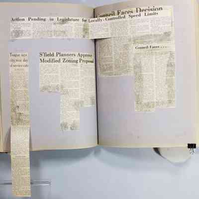 Page 84 newspaper clippings unfolded
