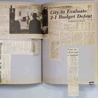 Pages 95 newspaper clippings unfolded