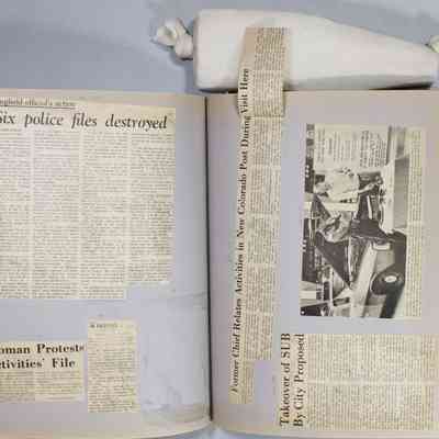 Pages 102 - 103 newspaper clippings unfolded