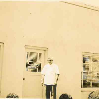 Photograph of Dr. William Neal Dow, Dentist, In Front of Office, Springfield, OR, Date Unknown