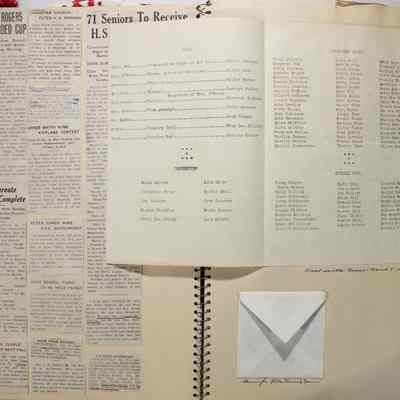 Pages 26 and 27 white pamphlet open