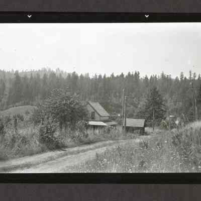Photograph of House on country road, date unknown