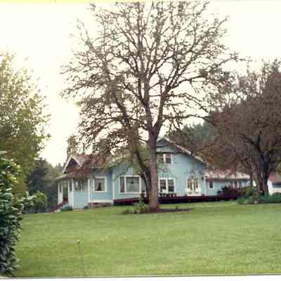 Photograph of unknown blue house