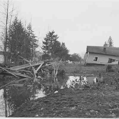 Photograph of house damaged by flood, Springfield, Oregon, 1927
