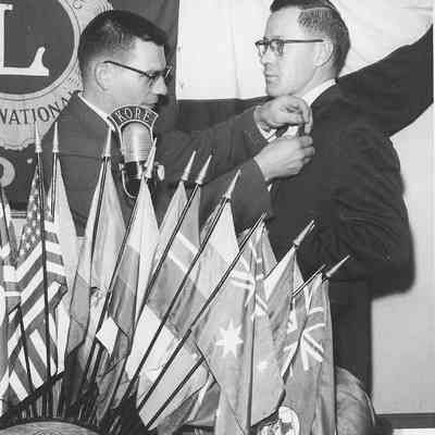 Photograph of a Lions Club ceremony with Don Ebbert, date unknown