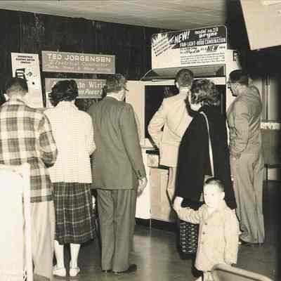Photograph of people browsing display at Springfield Electric Appliance Show, Springfield, Oregon, 1954