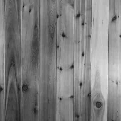 Photograph of Verticle Paneling with Knots, Date Unkown