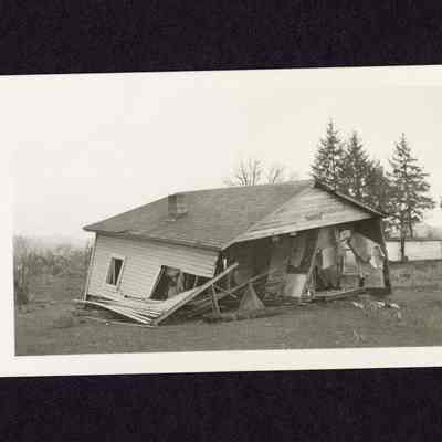 Photograph, House Damaged in a Flood, Date Unknown.