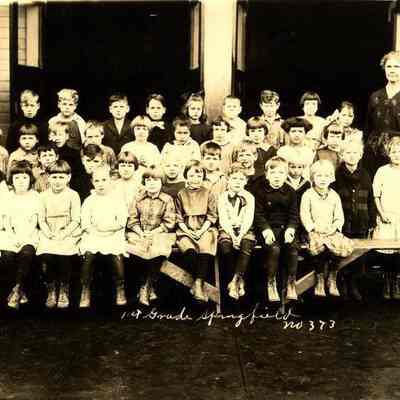 Photograph of first grade students with teacher Elizabeth Page, Springfield, Oregon, date unknown.