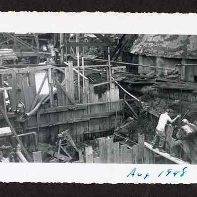 Photograph of the construction of the new dam at Booth-Kelly Lumber Mill
