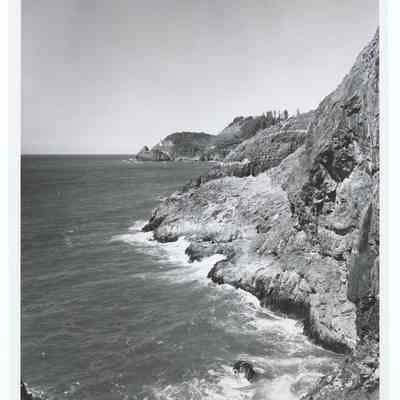 Photograph of Heceta Head Lighthouse and shoreline, North of Florence, circa 1969