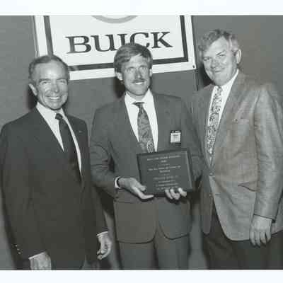 Photograph of Robert Scherer and others, Springfield Buick, 1992