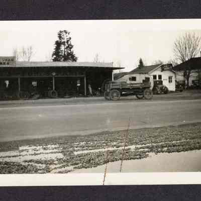 Photograph of Used Tire Shop from Shell Station, undated