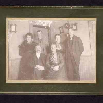 Photograph of 6 people inside a house