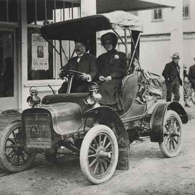 Couple in Cadillac in front of Springfield Hotel on Main Street, 1908