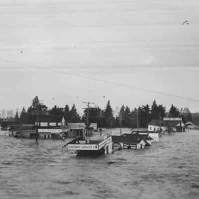 Photograph of flooded businesses during the 1927 flood, Springfield, Oregon.