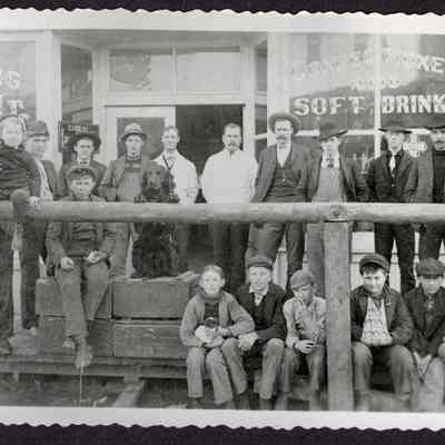 Photograph of group of men and boys outside Fry & Rankin Building, 1904
