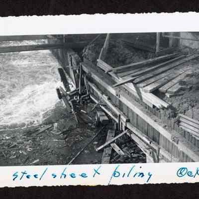 Photograph of the construction of the new dam at Booth-Kelly Lumber Mill